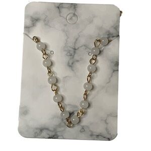 Gold pearl necklace